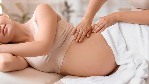 Woman receiving a massage on her back with a blurred background